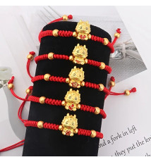 Bracelet rouge tressé ajustable PETiT DRAGON doré