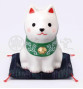 Figurine en porcelaine ShibA blanc sur coussin Shibori (h7.5cm)