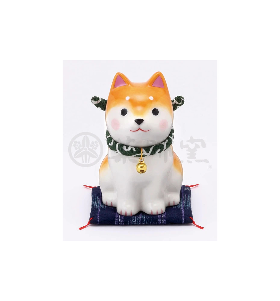 Figurine en porcelaine ShibA roux sur coussin Shibori (h10cm)