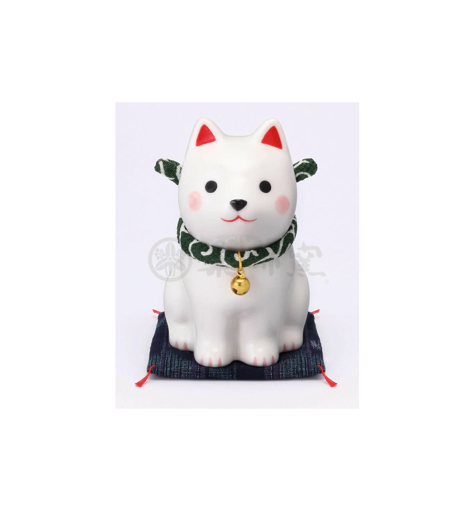 Figurine en porcelaine ShibA blanc sur coussin Shibori (h10cm)