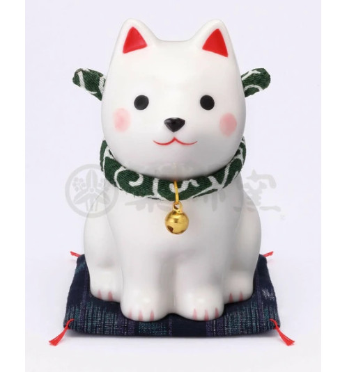 Figurine en porcelaine ShibA blanc sur coussin Shibori (h10cm)