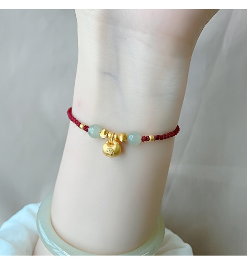 Bracelet rouge tressé ajustable BOURSE d'OR (Richesse)